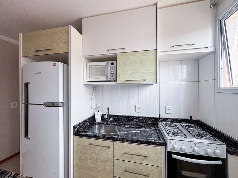 Apê com A/C, Garagem e Wi-Fi | 300m Canasvieiras